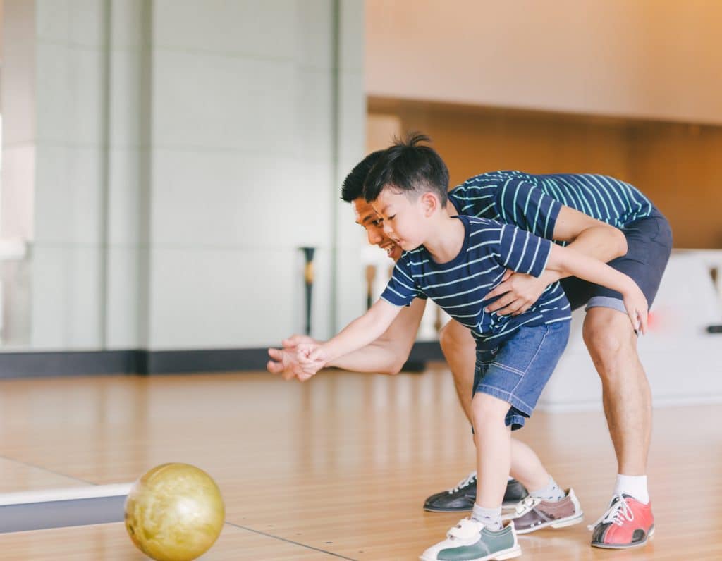 Bowling with father and son.