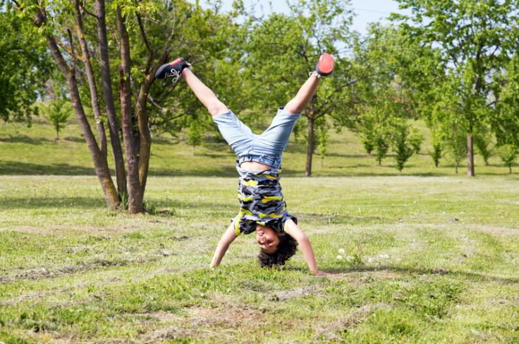 Boy doing a handstand