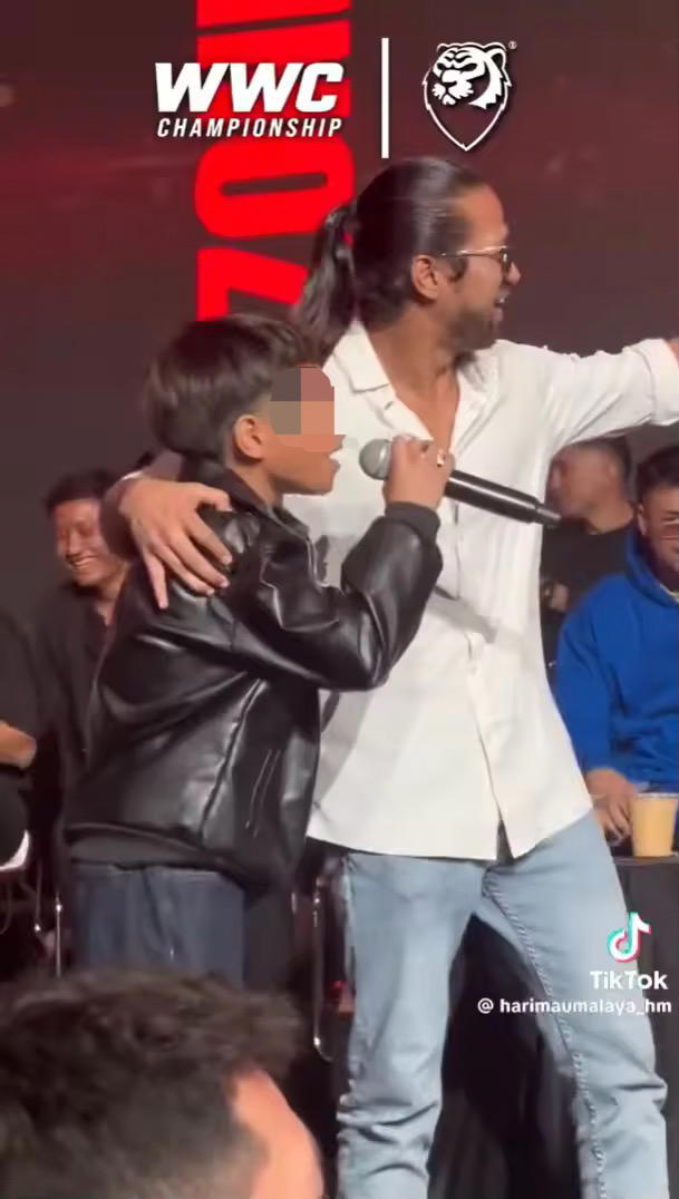 Boys scuffling with each other at MMA event 3