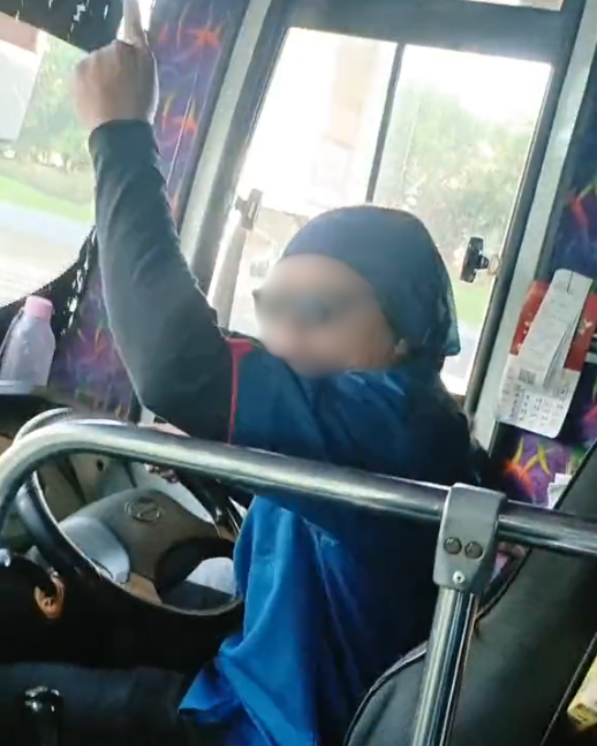 Bus driver screaming at her