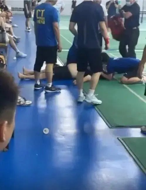 Bystanders doing CPR on man who collapsed at badminton court