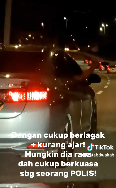M'sian man drives recklessly and flashes police id at another driver along duke highway