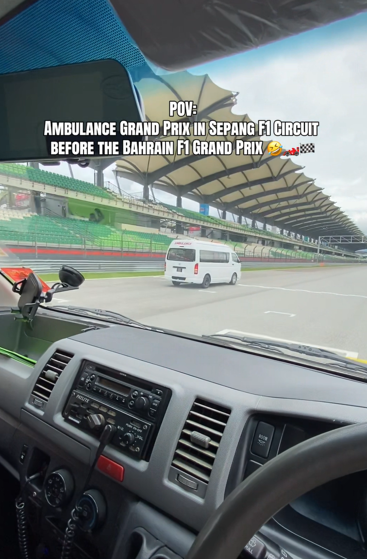 car and ambulance racing at sepang circuit