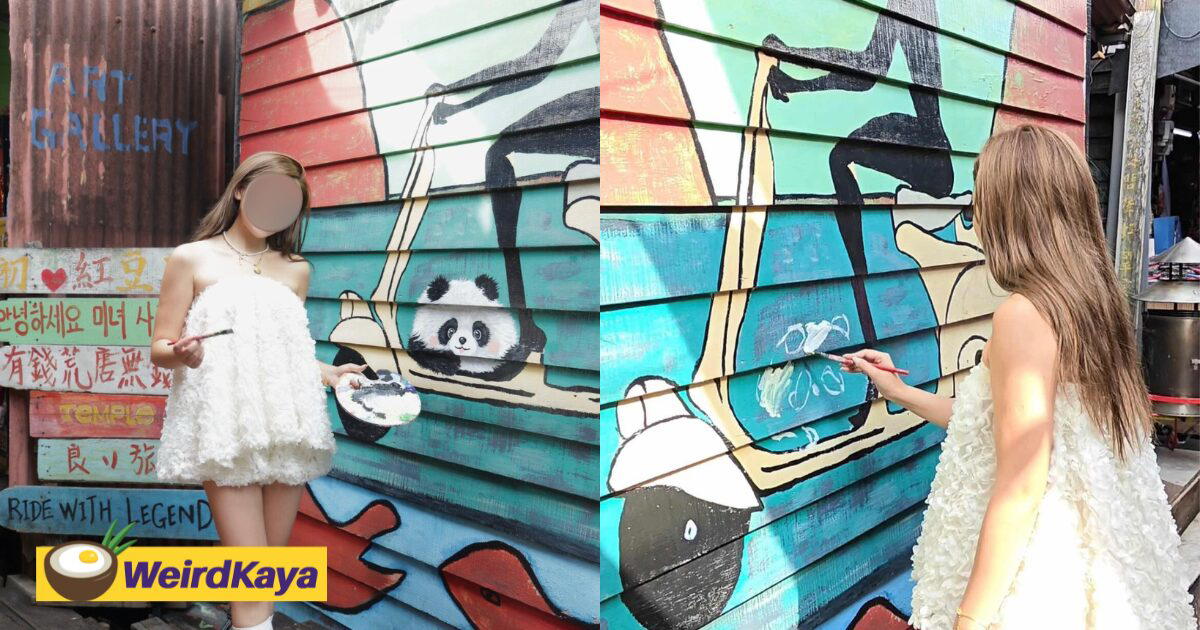 Chinese Tourist ‘Modifies’ Mural At Penang’s Chew Jetty, Sparks Online Anger