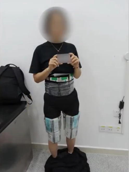 china couple tries to smuggle phones woman