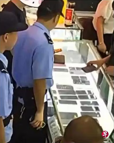 China police retrieve iphone 15 at shopping mall