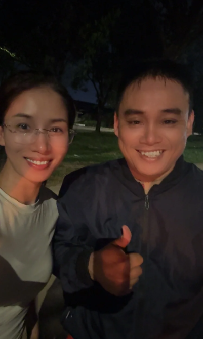 China woman poses with M'sian man who helped with flat tyre