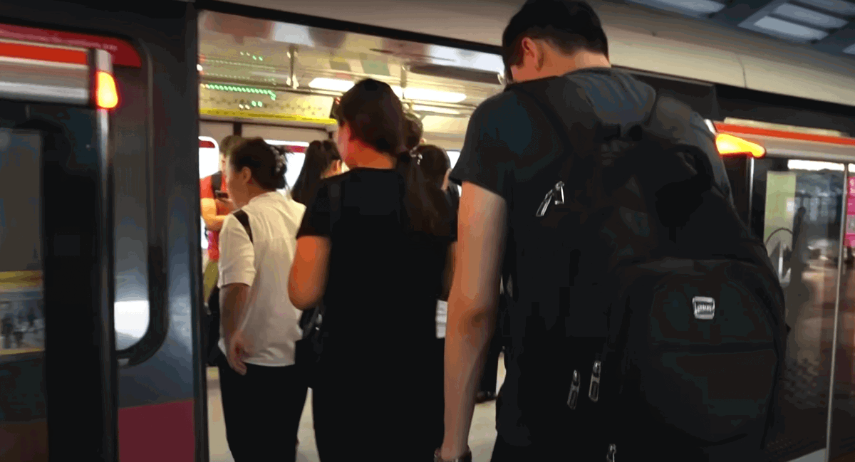 Chun weng taking sg public transportation-min