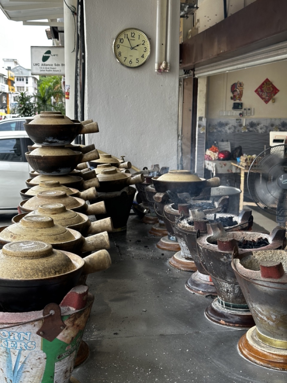 Claypot chicken rice in the making