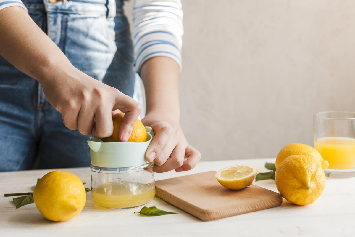 Lemon being squeezed