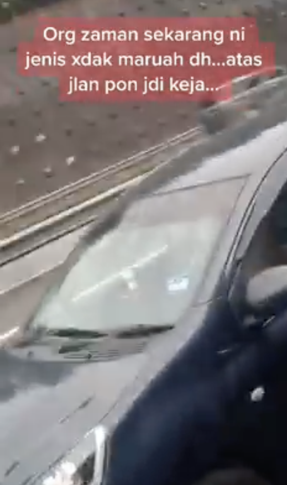 Couple caught having fun while driving on highway