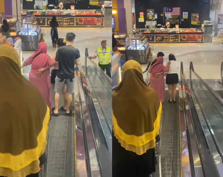 Couple helps makcik on escalator (1)