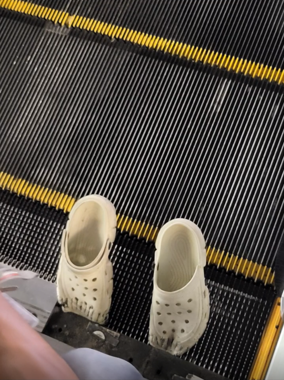 Crocs stuck in escalator