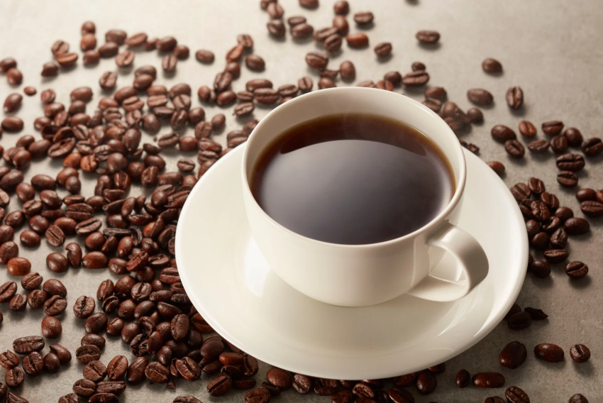 cup of coffee with beans