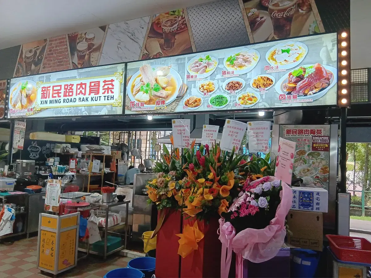 Customers send their condolences to Chua at BKT stall