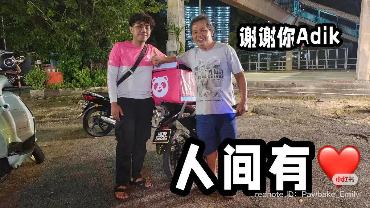 Delivery rider poses with wallet owner