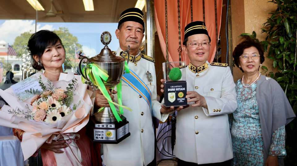 durian owner at award ceremony