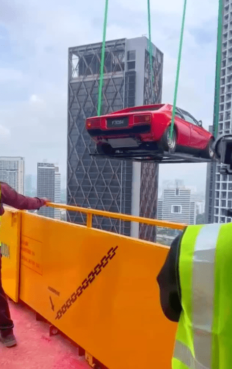 Ferrari lifted into tall building (1)