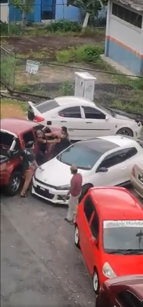 Drivers fighting outside gombak school