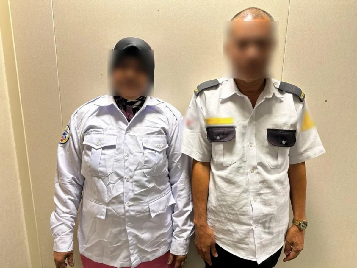 Filipino couple caught for using fake m'sian ic