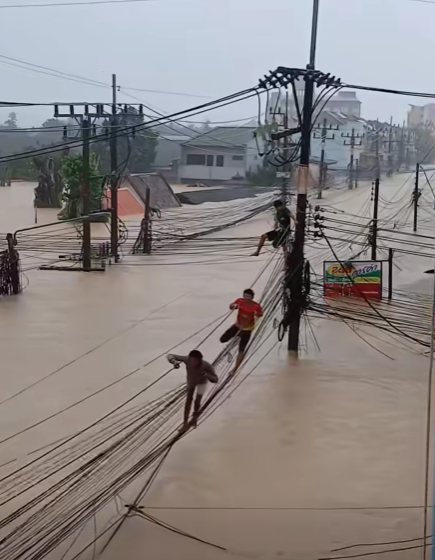 flood victim on electric cable