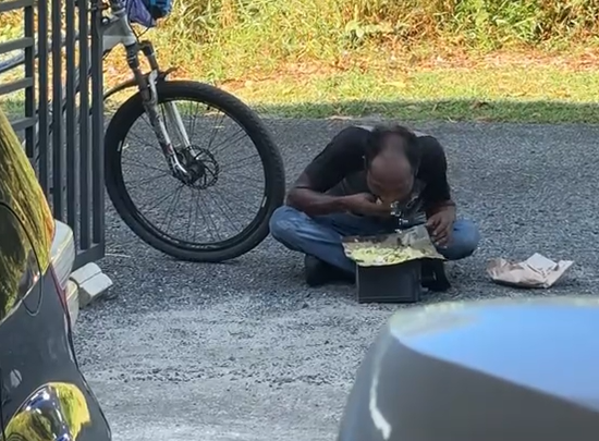 Foreign worker eating food