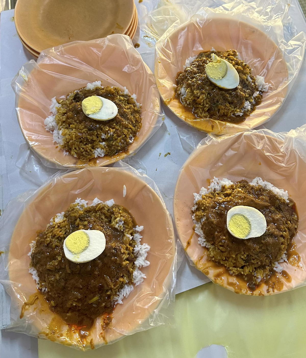 Four plates of nasi kandar