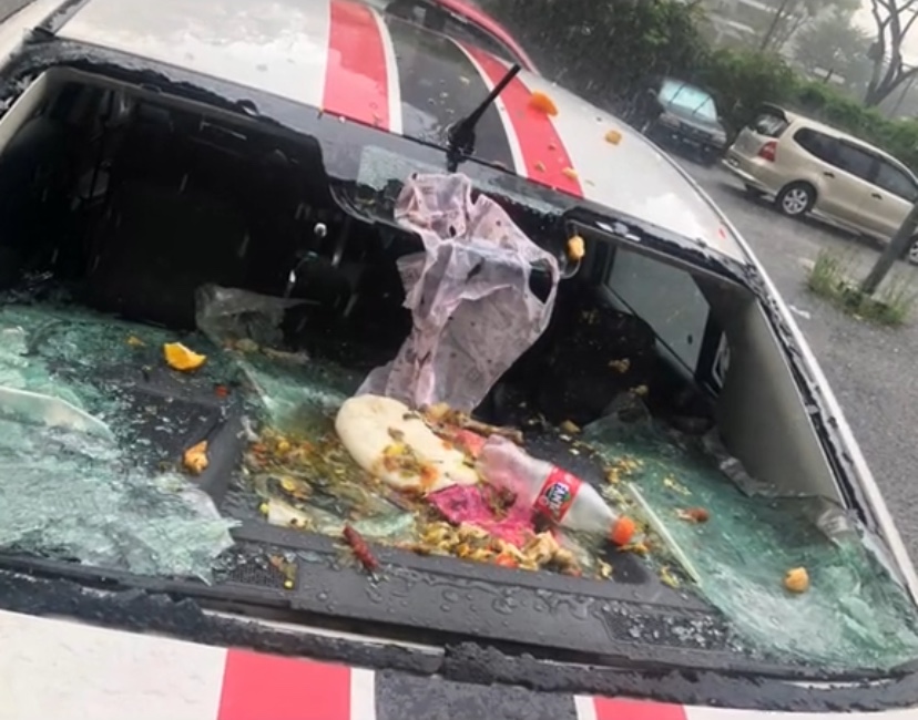 M'sian woman's windscreen smashed after selfish resident throws rubbish from top floor