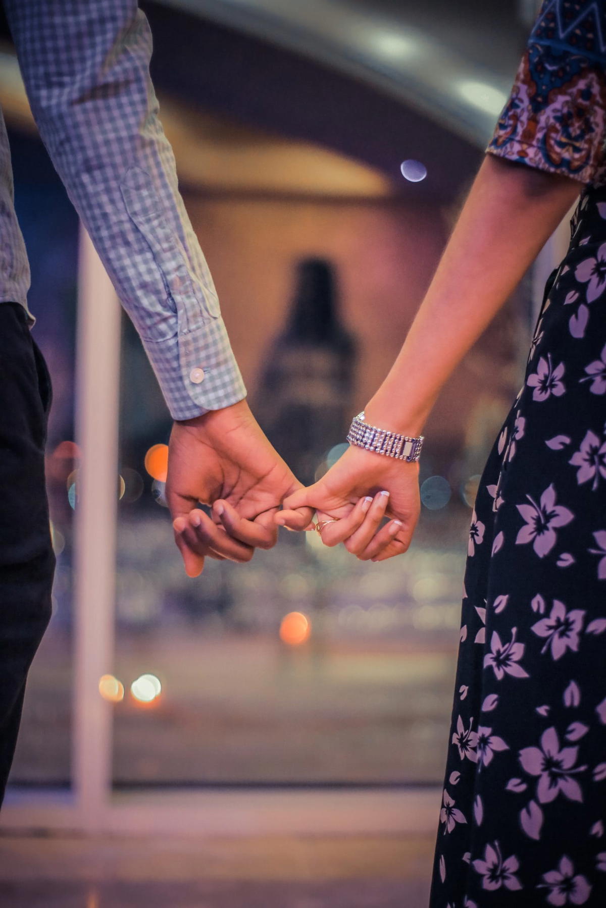 Couple holding hands