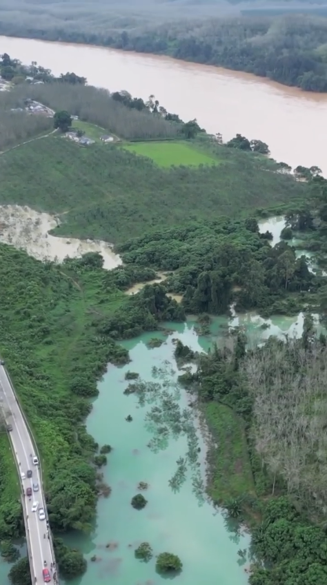 Drone view of machang's jade green river.