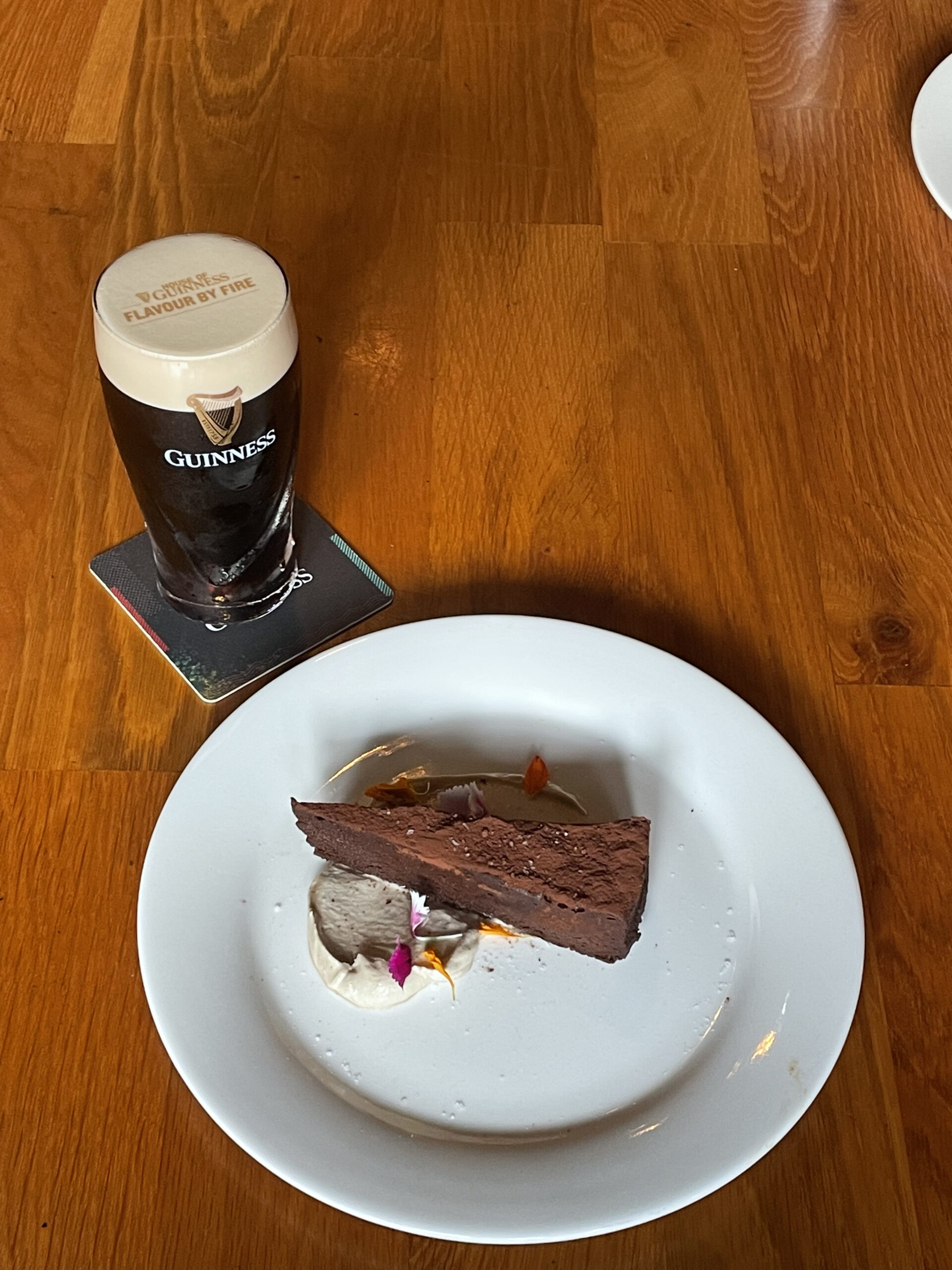 Guinness-infused cream with flourless cholcolate cake