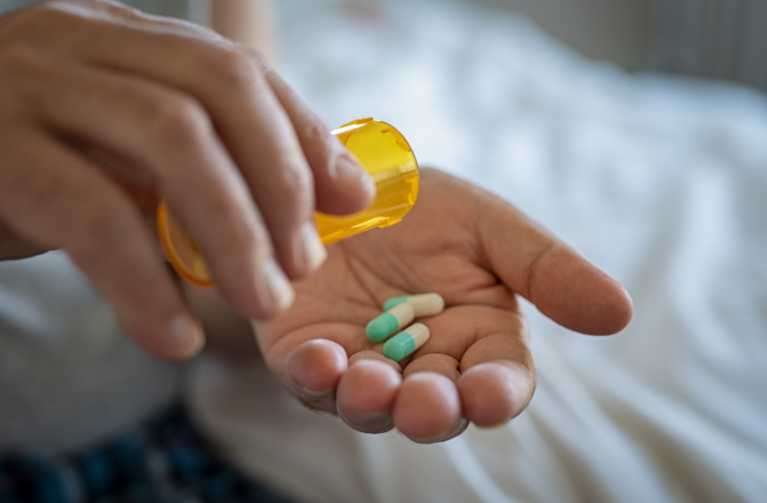 hand holding pills
