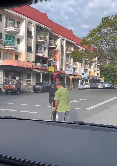 Helping elderly to cross the road