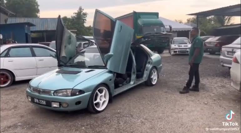 M'sian man converts his proton wira into an imitation tesla