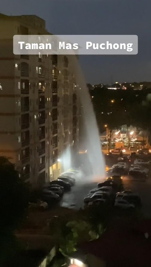 Puchong flat turns into giant 'waterfall' after rooftop water tank bursts, leaves 6 cars damaged