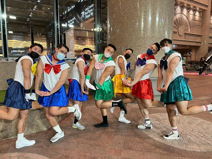 This drunk guy attempts to fight a group of masculine men dressed in sailor moons costumes in hong kong
