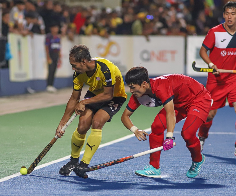 Malaysian hockey team in action