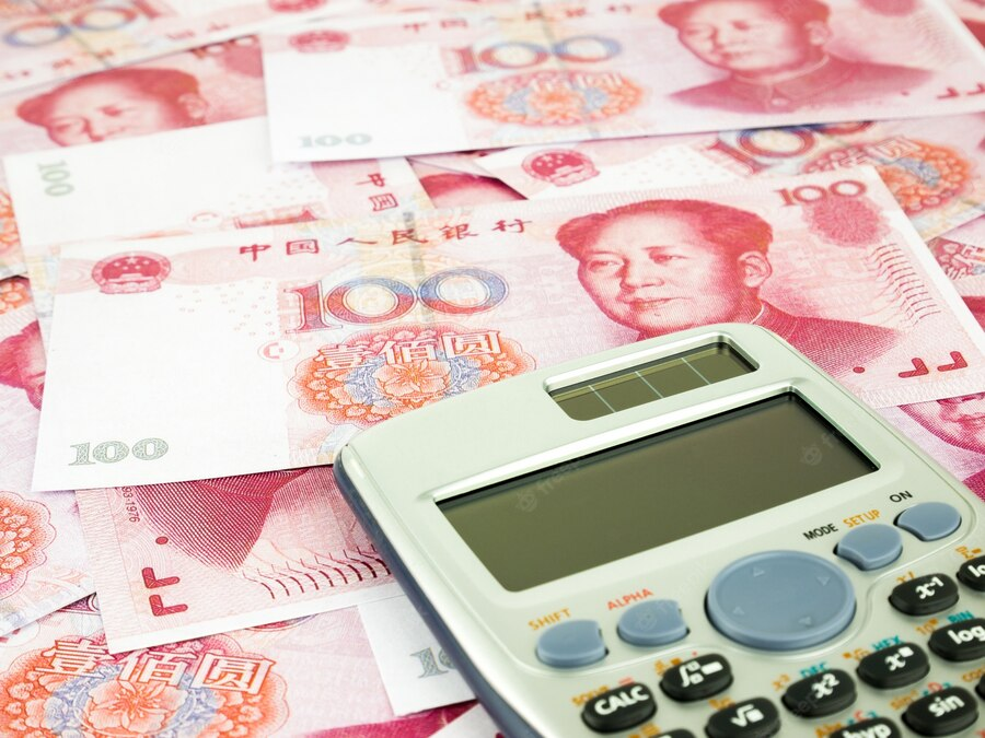 Rmb notes with a calculator