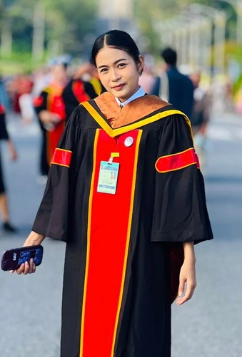 Thai woman bows before her brother's feet to thank him for giving up his education for hers