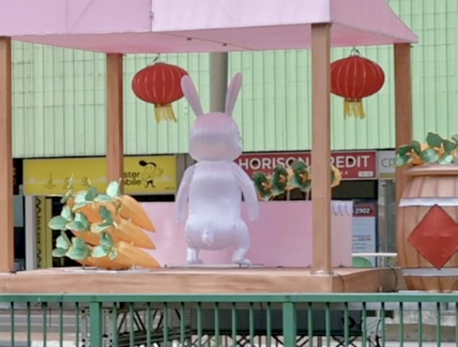 Pooping cny rabbit mascot