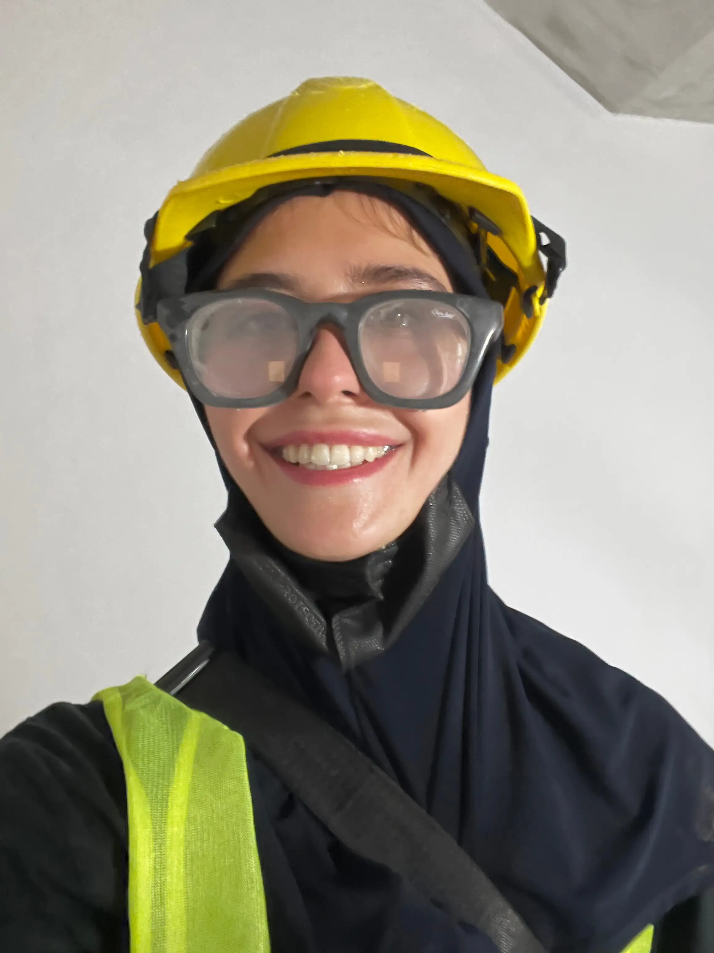 Angela nikolau disguised as construction worker