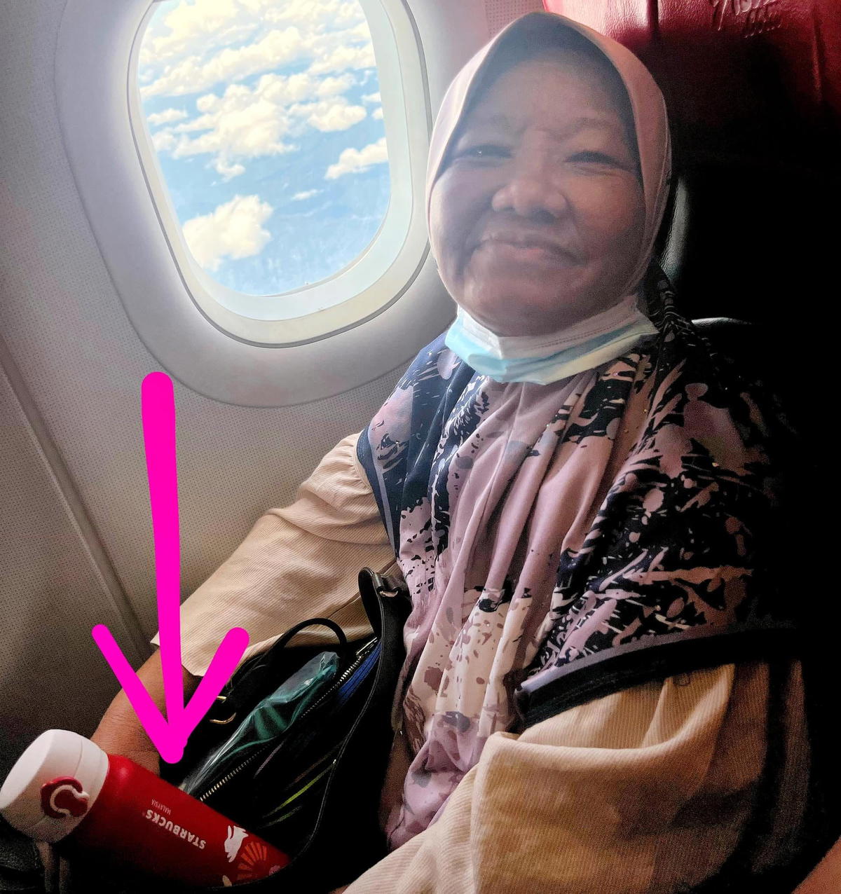 Syukor Majid's mum holding a Starbucks tumbler