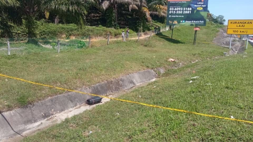 Chopped up body of man found along North-South Expressway in a suitcase