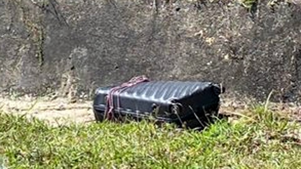 Chopped up body of man found along north-south expressway in a suitcase
