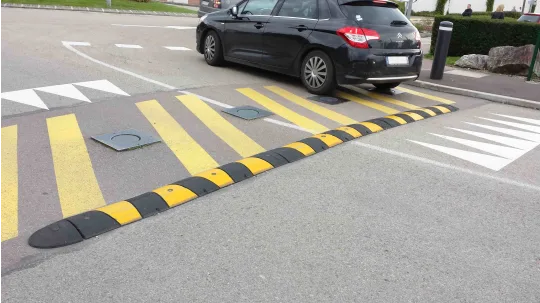 Car crossing a speed bump