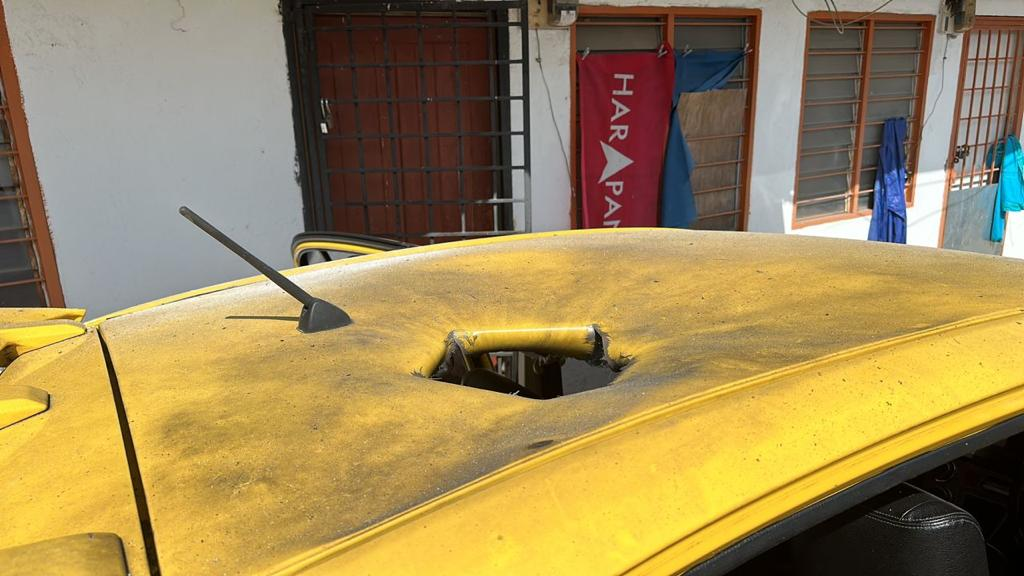 M’sian man’s myvi left with giant hole on roof due to explosives