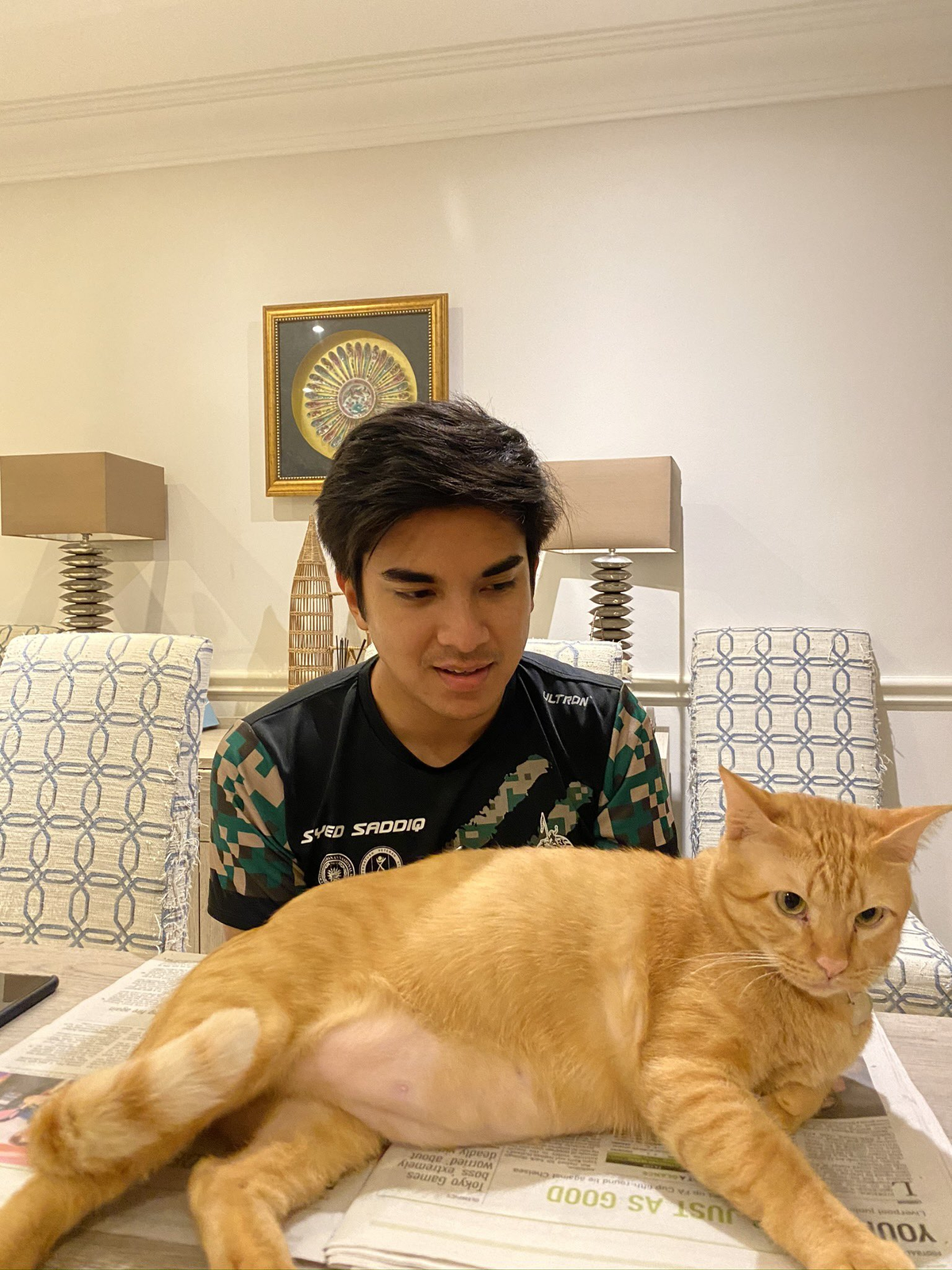 Syed saddiq and pet cat toby