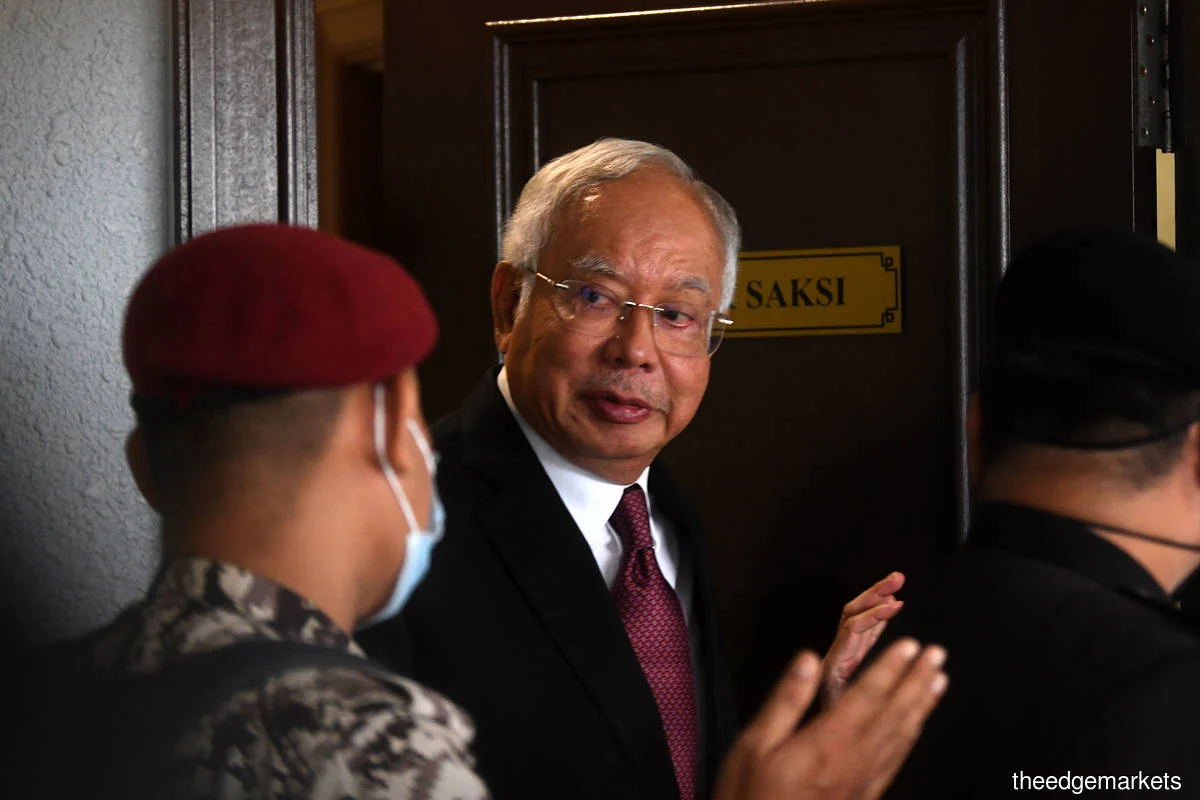 Najib razak acquitted of tampering 1mdb audit
