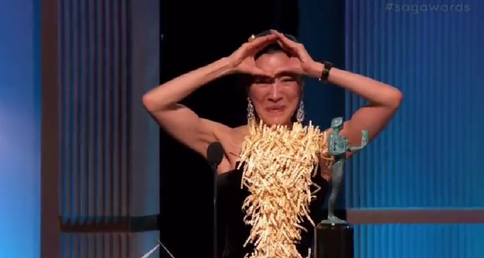 Why are they making this gesture whenever michelle yeoh wins award for 'everything everywhere all at once'? | weirdkaya