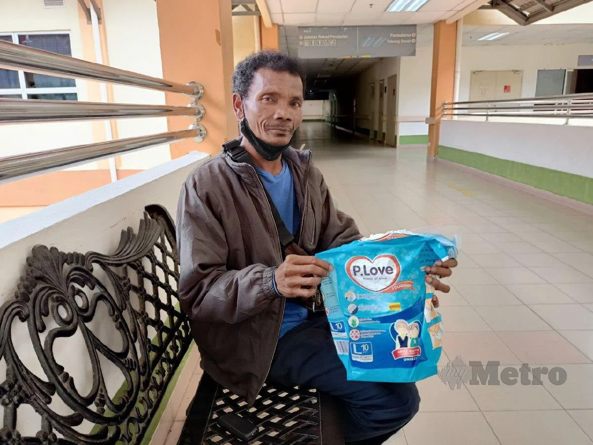 Orang asli man stays in hospital for 2 months to care for wife in coma | weirdkaya